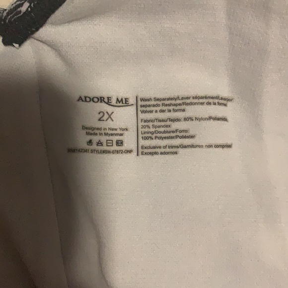 A one-piece bathing suit and low back and keyhole front. White and blue - Picture 3 of 3